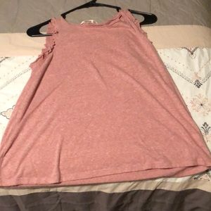 Cute pink tank top with ruffle sleeves.